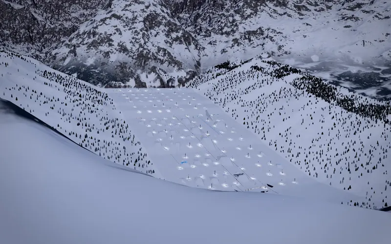 Voltage Park, a floodlit terrain park at night with jumps and a superpipe